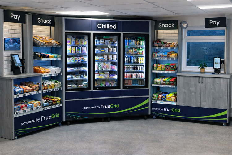 TrueGrid micro-market setup with shelving, coolers, and checkout kiosk